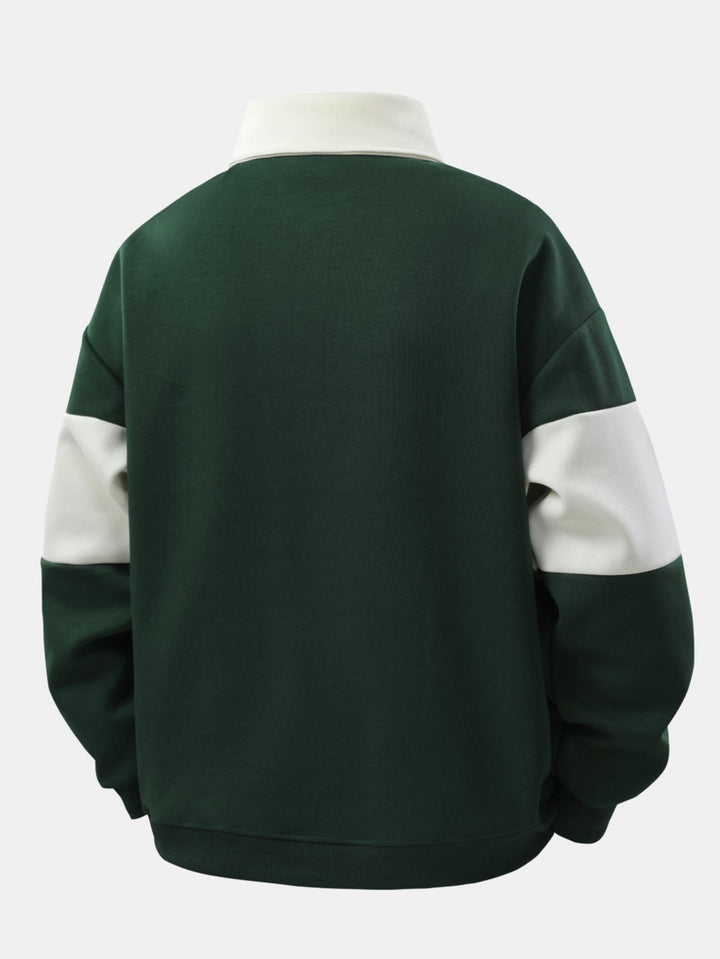 Hendrik | Polosweater met patchworkdetails en kleurvlakken en relaxte pasvorm