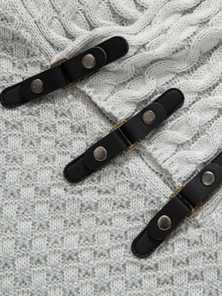 Guus | Gebreide jacquard coltrui met leren gespdetails