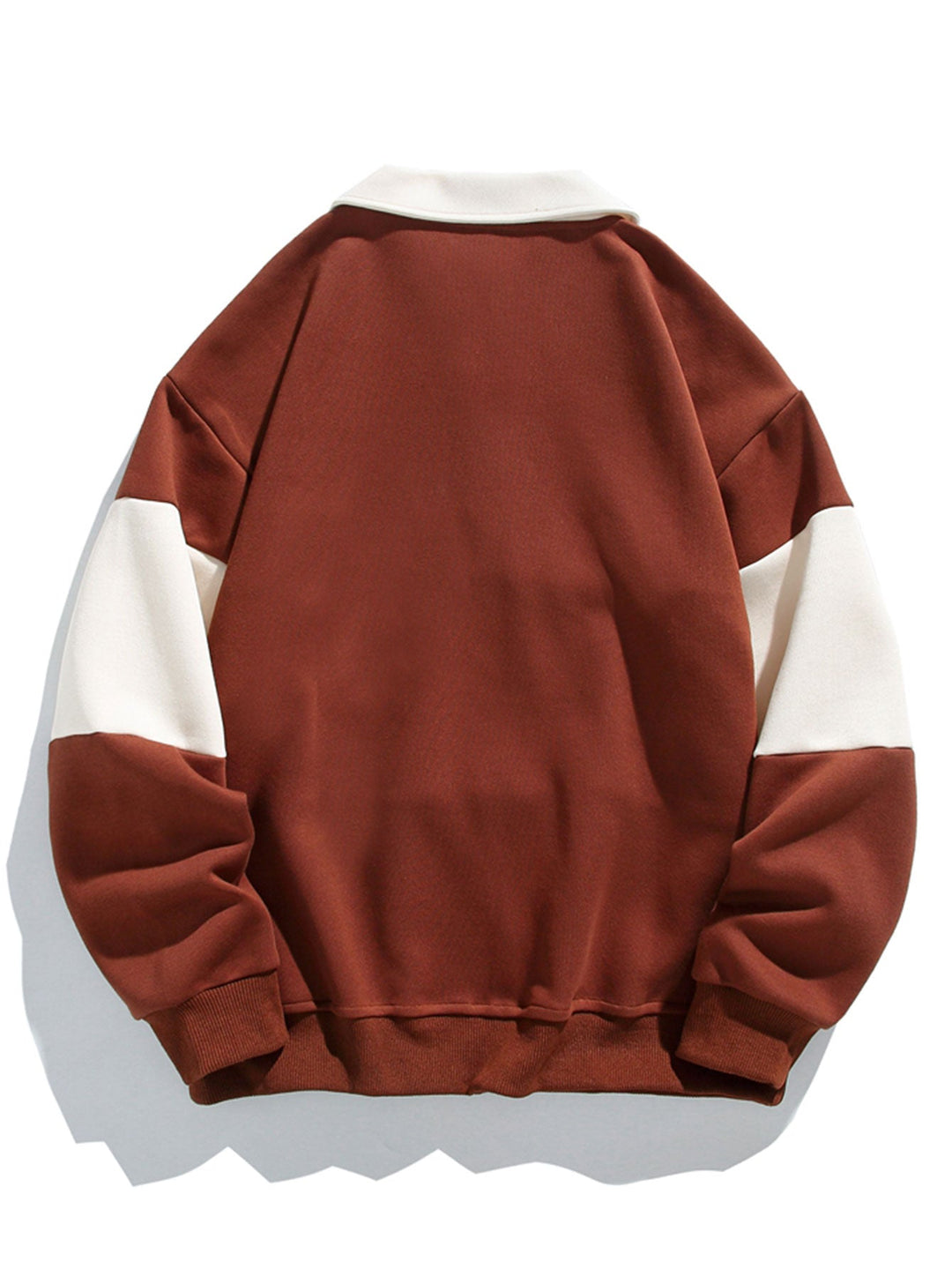 Jan | Polosweater met patchworkdetails en kleurvlakken en relaxte pasvorm