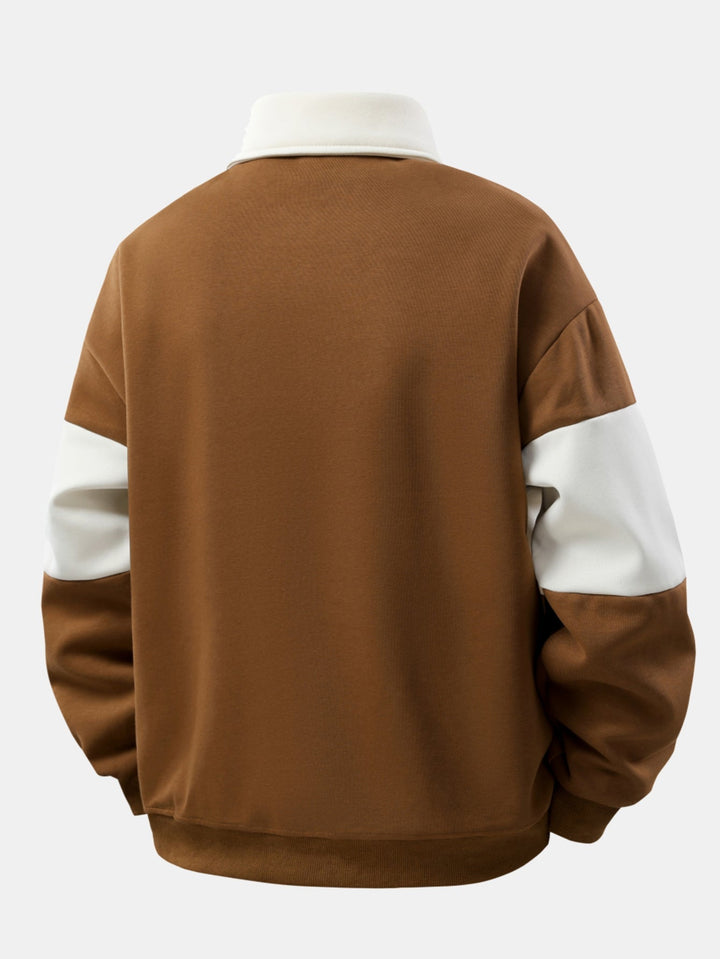 Hendrik | Polosweater met patchworkdetails en kleurvlakken en relaxte pasvorm