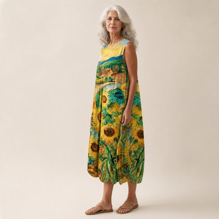 Pien | Mouwloze midi-jurk met zonnebloemenveld