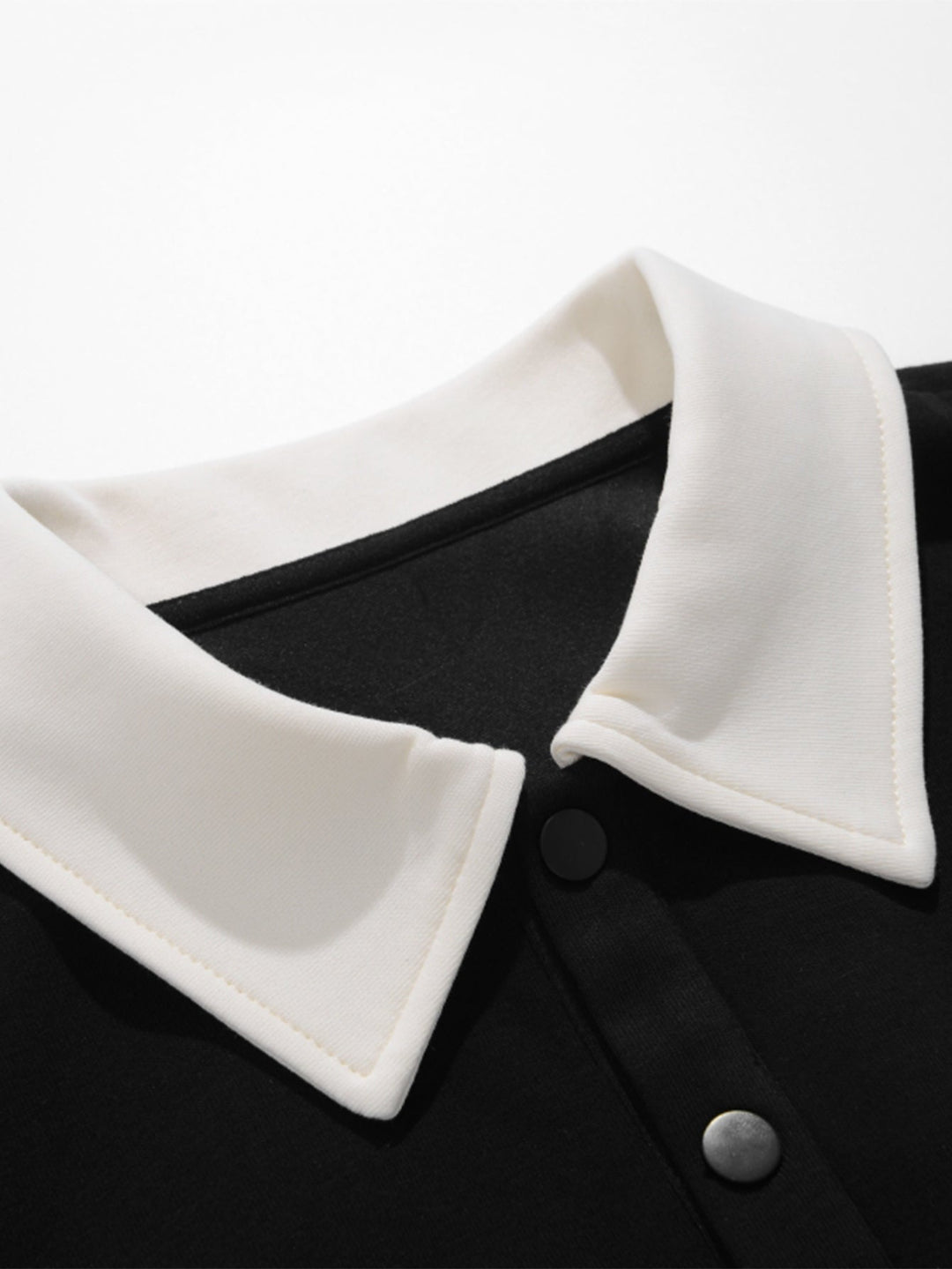 Hendrik | Polosweater met patchworkdetails en kleurvlakken en relaxte pasvorm