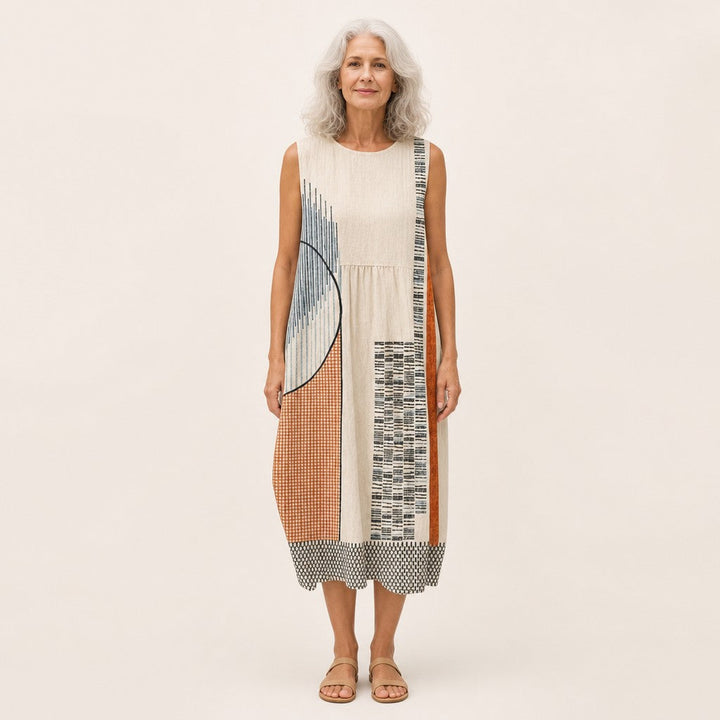 Greet | Mouwloze midi-jurk met grafische patchworkprint