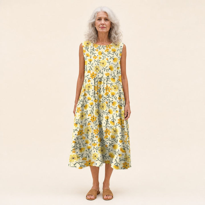 Daphne | Mouwloze midi-jurk met kleine gele bloemen