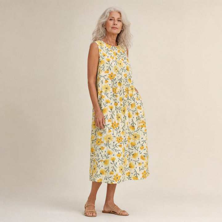 Daphne | Mouwloze midi-jurk met kleine gele bloemen
