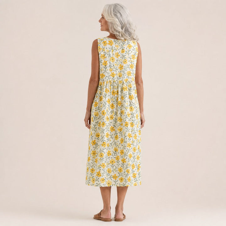 Daphne | Mouwloze midi-jurk met kleine gele bloemen