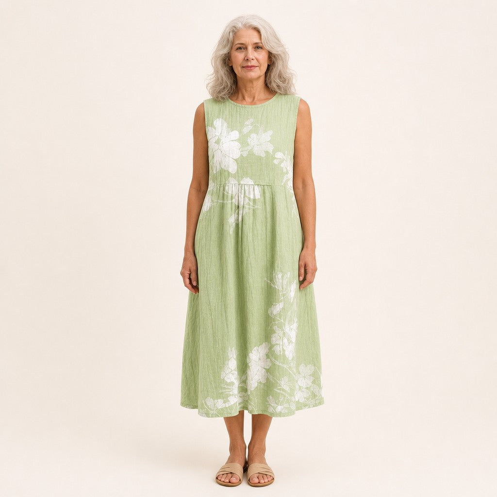 Karin | Mouwloze midi-jurk met witte bloemen op groen