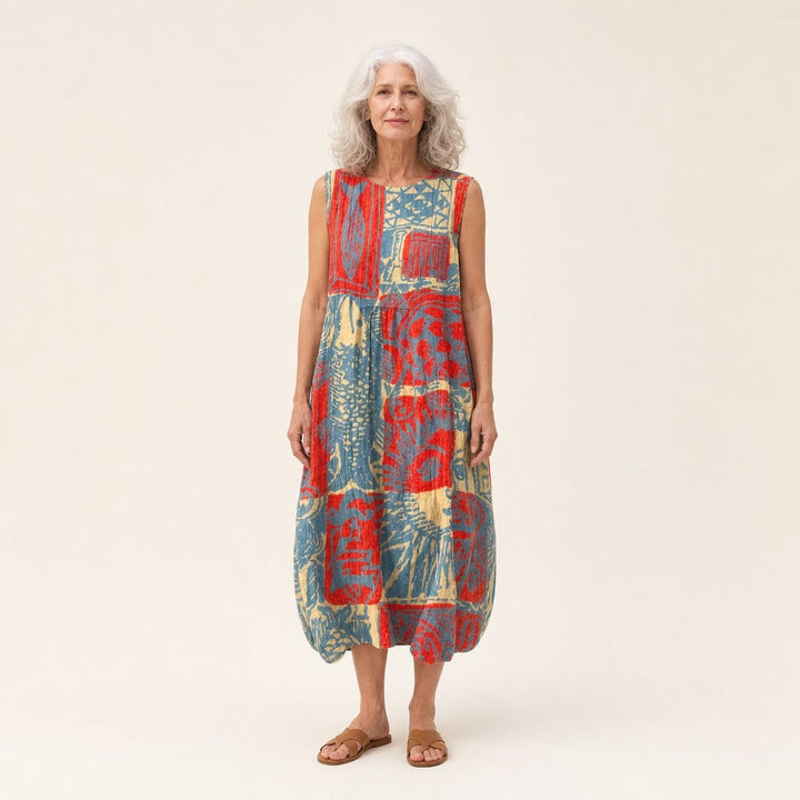 Veerle | Mouwloze midi-jurk met abstracte collageprint