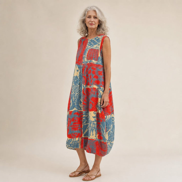 Veerle | Mouwloze midi-jurk met abstracte collageprint