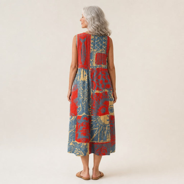 Veerle | Mouwloze midi-jurk met abstracte collageprint