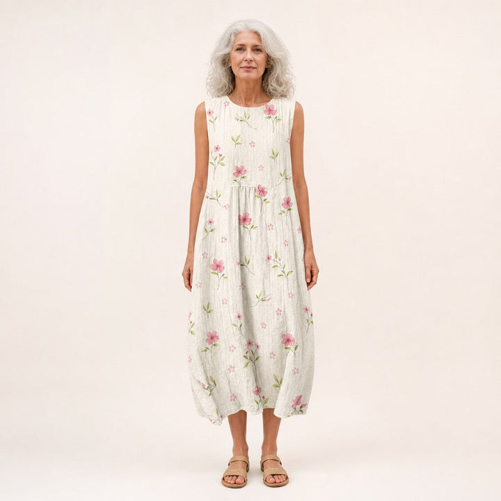 Carla | Mouwloze midi-jurk met kleine roze bloemen