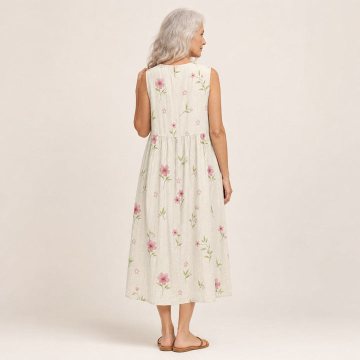Carla | Mouwloze midi-jurk met kleine roze bloemen