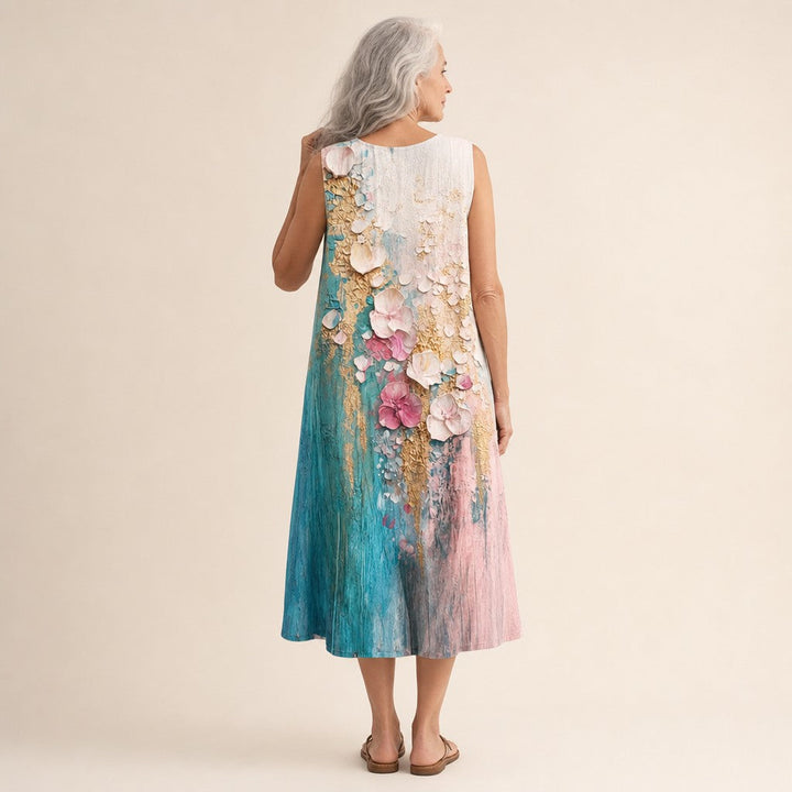 Ilse | Mouwloze midi-jurk met geschilderde bloemen