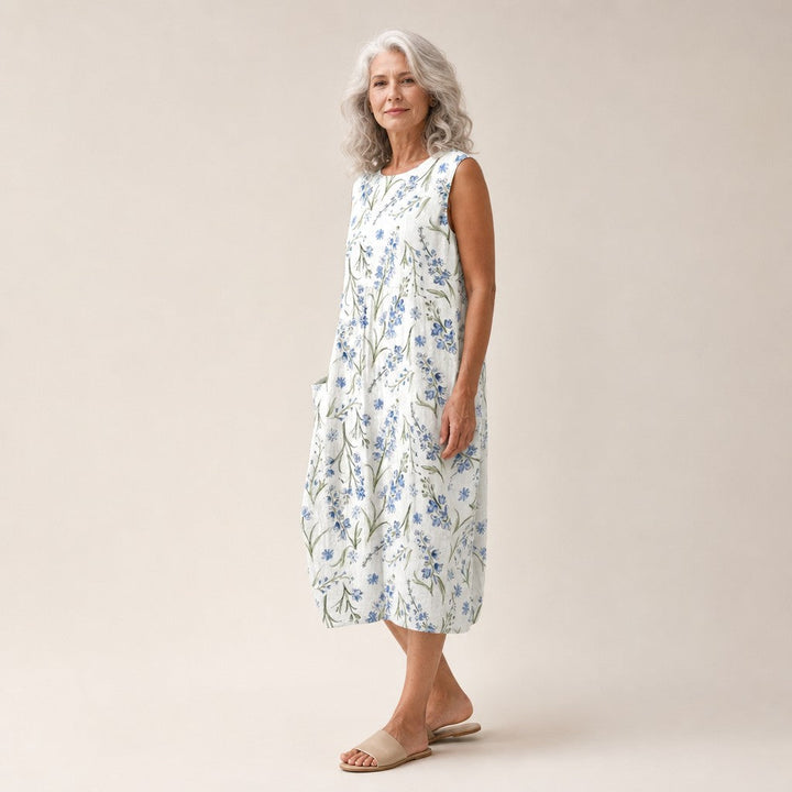 Patricia | Mouwloze midi-jurk met blauwe veldbloemen