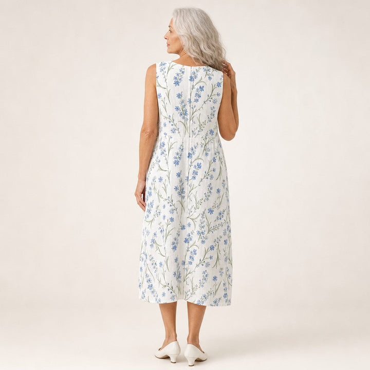 Patricia | Mouwloze midi-jurk met blauwe veldbloemen