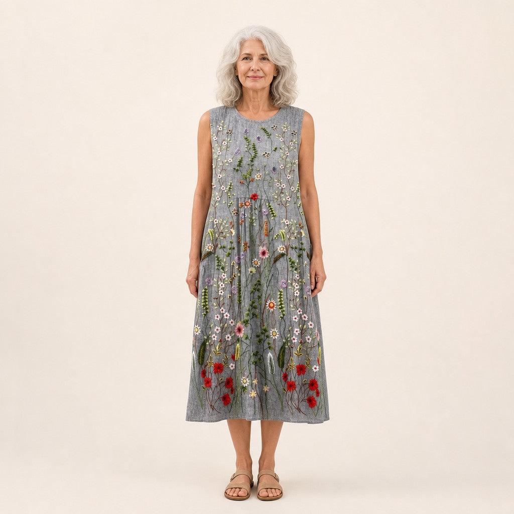 Sanne | Mouwloze midi-jurk met bloemenprint in borduurlook