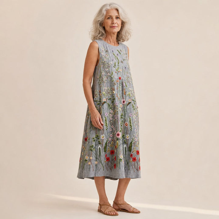 Sanne | Mouwloze midi-jurk met bloemenprint in borduurlook