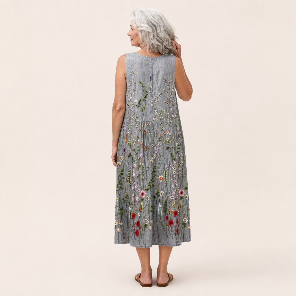 Sanne | Mouwloze midi-jurk met bloemenprint in borduurlook