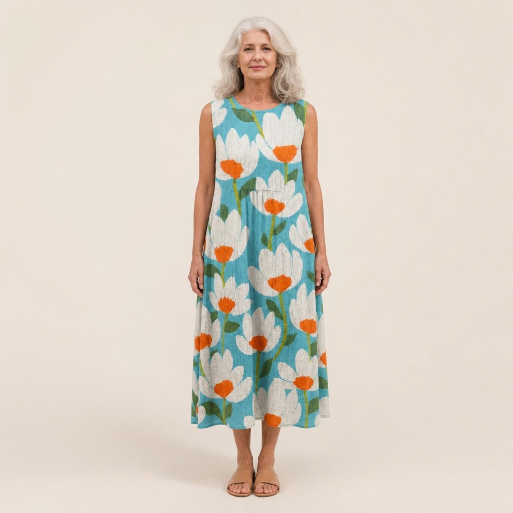 Ria | Mouwloze midi-jurk met bloemen op turquoise