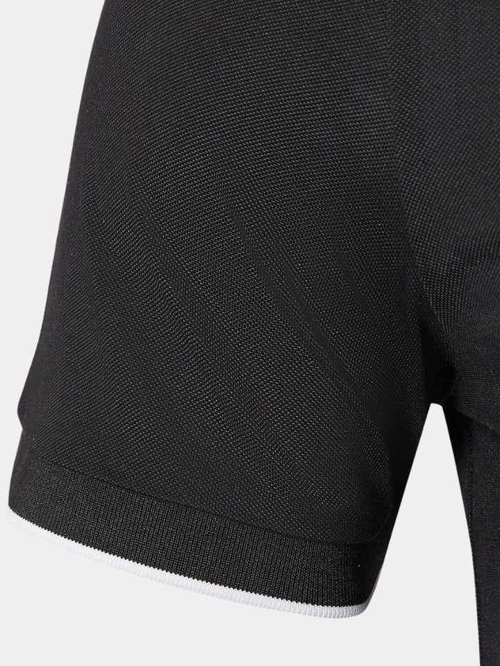 Iwan | Zwarte polo met ritskraag