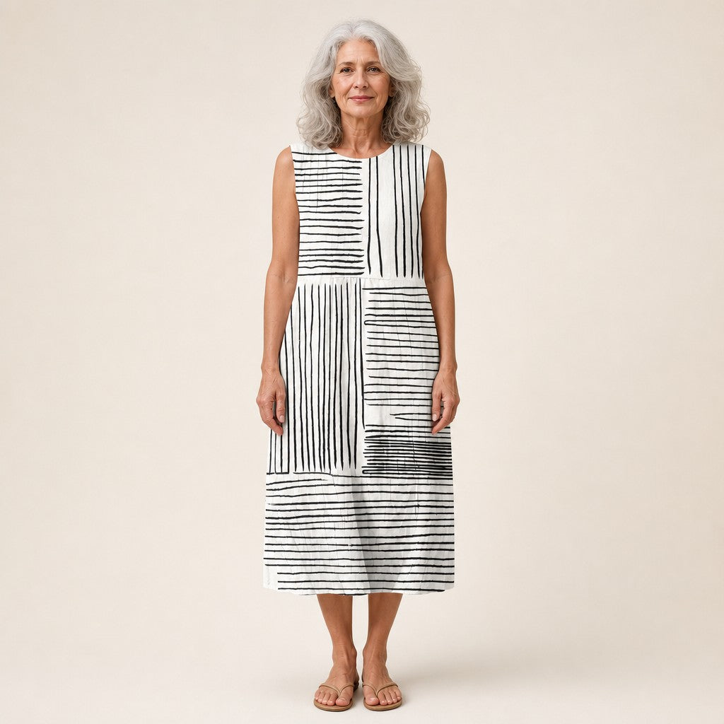 Maaike | Mouwloze midi-jurk met zwart-wit lijnpatroon