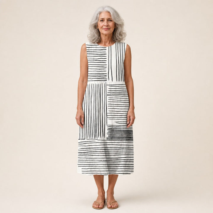 Maaike | Mouwloze midi-jurk met zwart-wit lijnpatroon