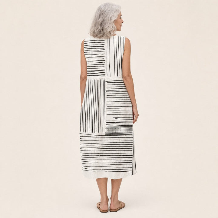 Maaike | Mouwloze midi-jurk met zwart-wit lijnpatroon