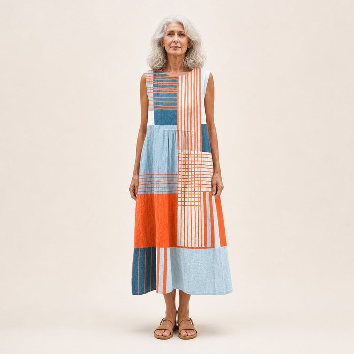 Leonie | Mouwloze midi-jurk met strepen en ruiten in oranje en blauw