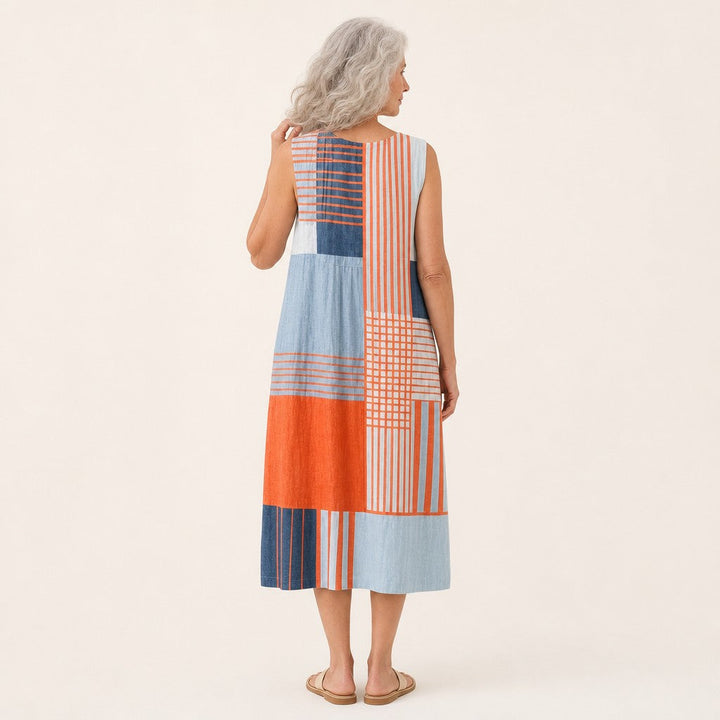Leonie | Mouwloze midi-jurk met strepen en ruiten in oranje en blauw