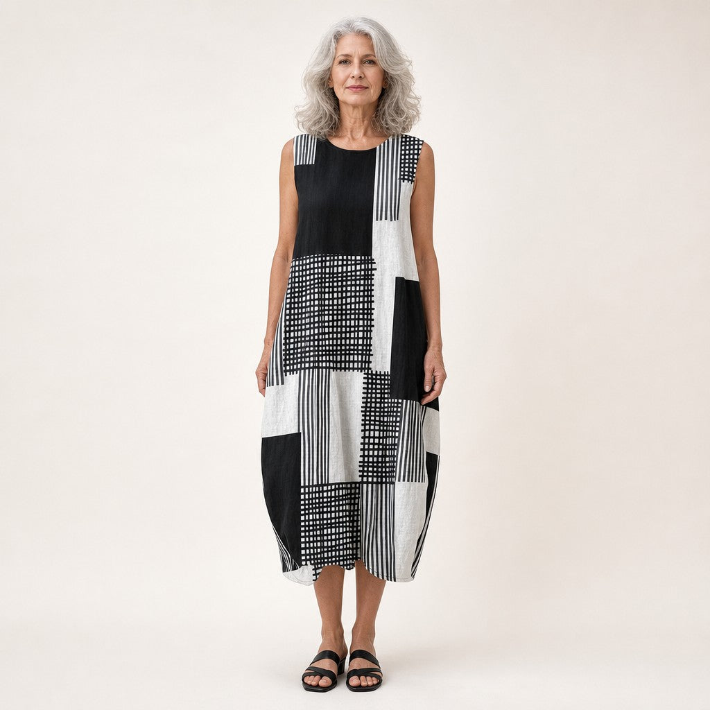 Nienke | Mouwloze midi-jurk met zwart-wit patchwork