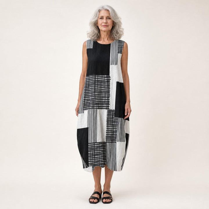 Nienke | Mouwloze midi-jurk met zwart-wit patchwork