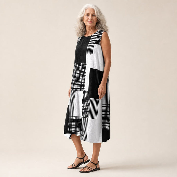 Nienke | Mouwloze midi-jurk met zwart-wit patchwork
