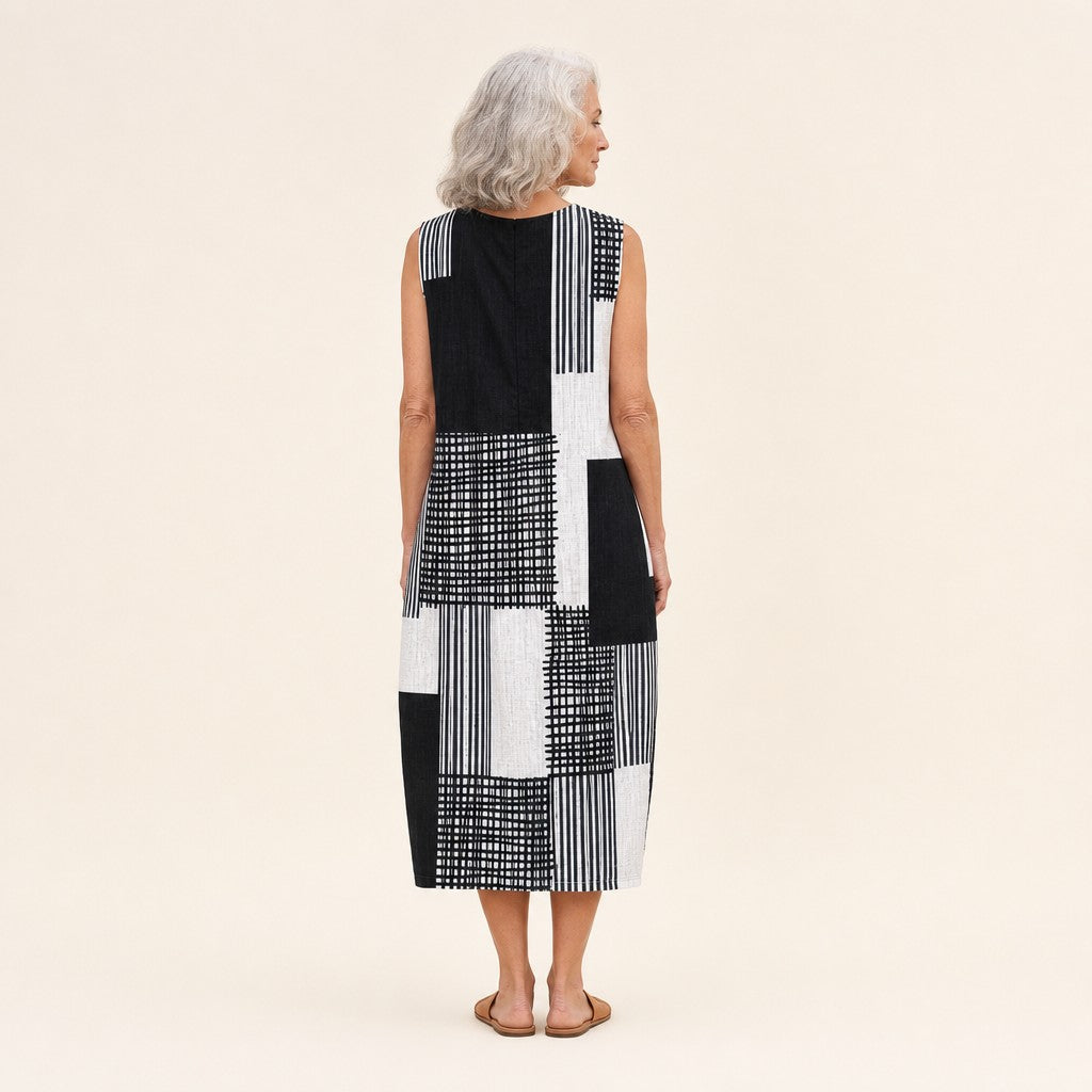 Nienke | Mouwloze midi-jurk met zwart-wit patchwork