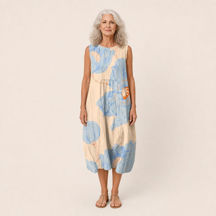 Renske | Mouwloze midi-jurk met grote blauwe bloemen