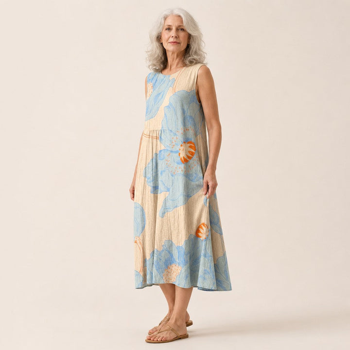 Renske | Mouwloze midi-jurk met grote blauwe bloemen