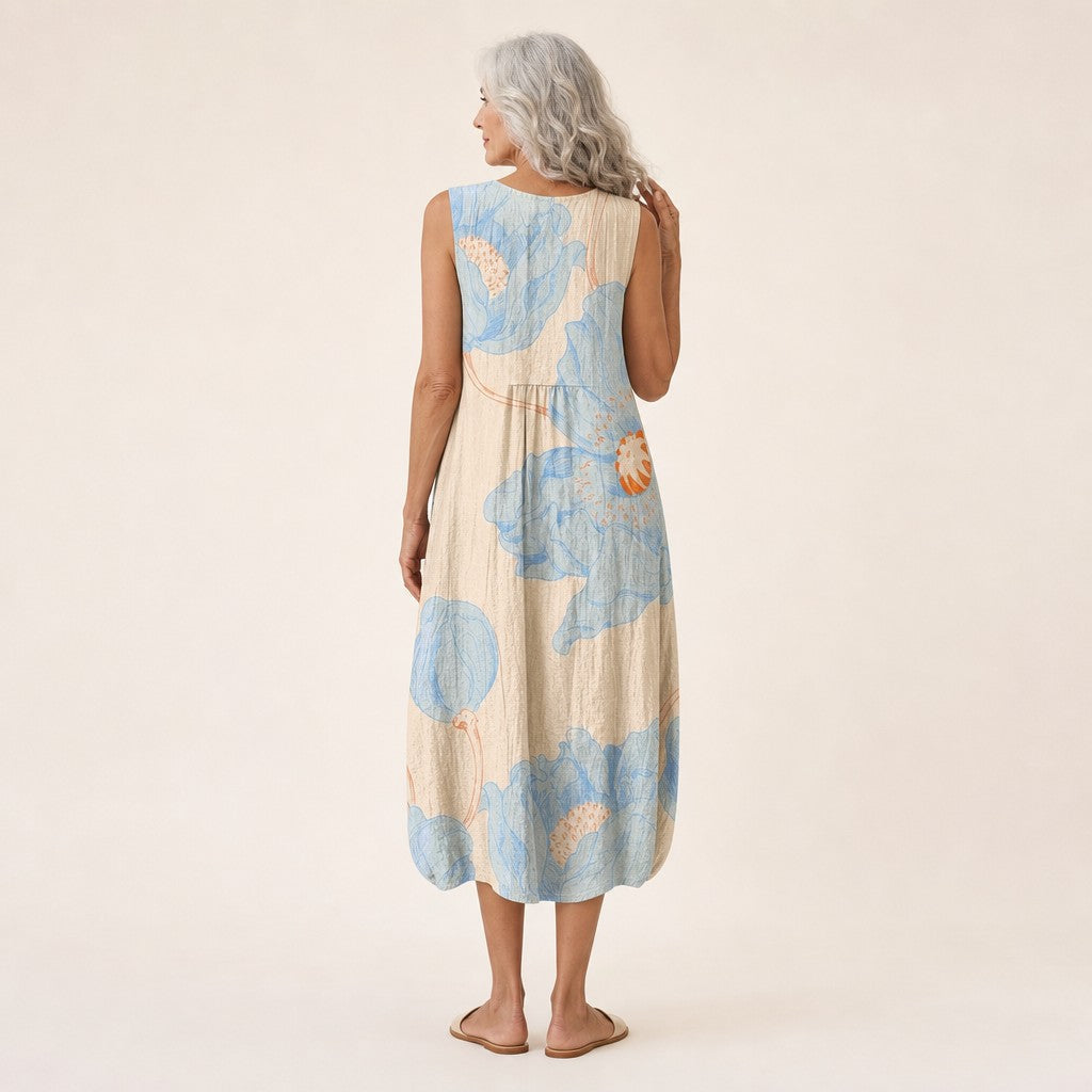 Renske | Mouwloze midi-jurk met grote blauwe bloemen