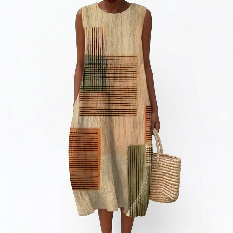 Ingrid | Mouwloze midi-jurk met patchworkprint
