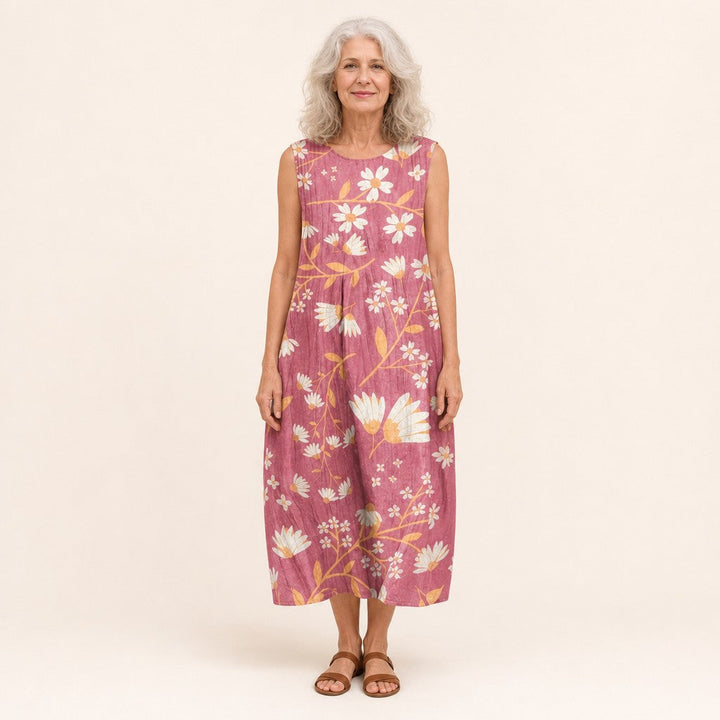 Chantal | Mouwloze midi-jurk met bloemen op oudroze