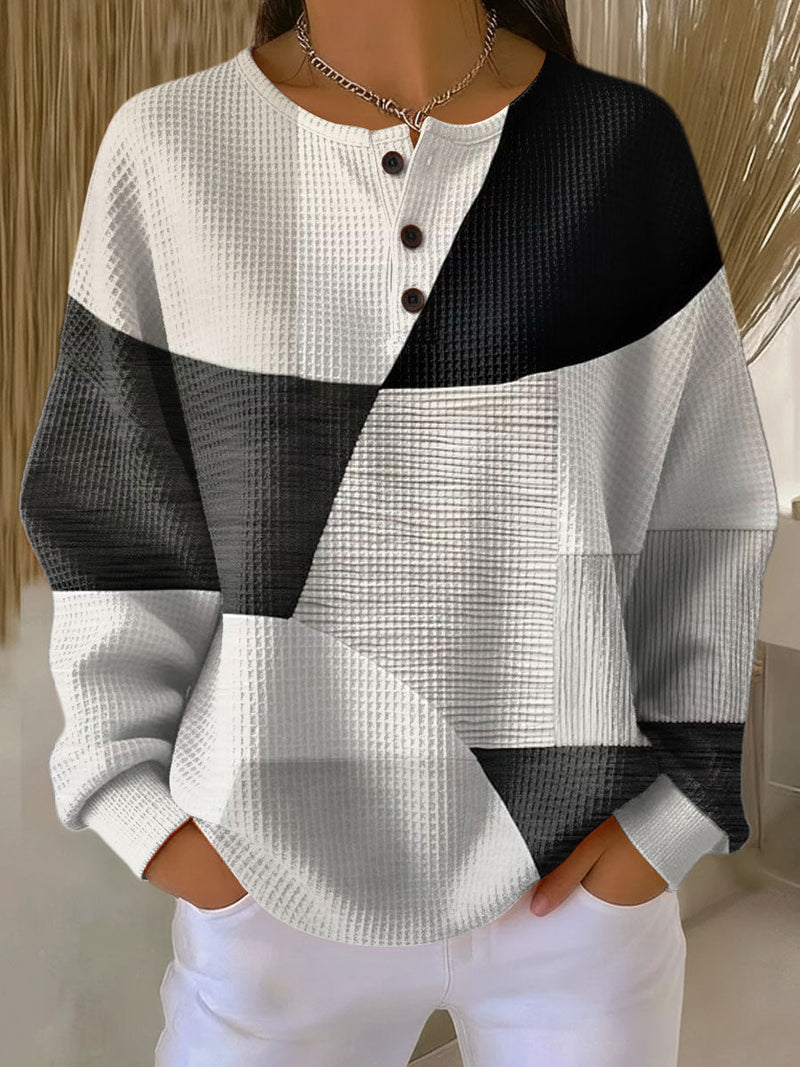 Marloes | Patchwork trui in zwart en wit
