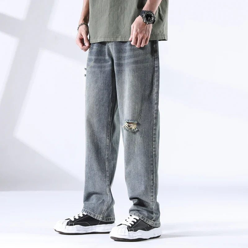 Nout | Verwassen jeans met scheurdetails en rechte pijpen