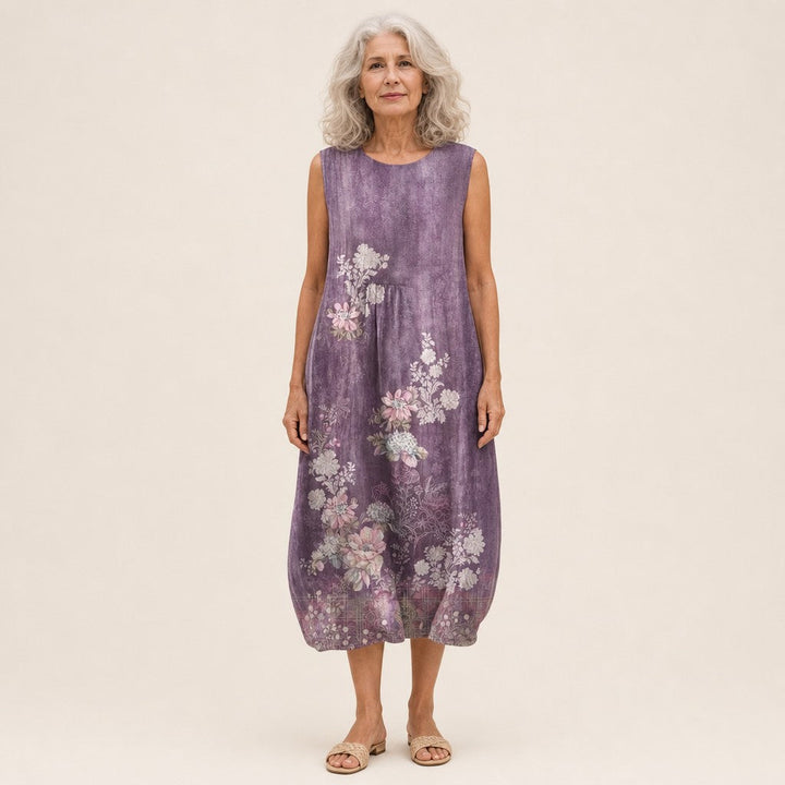 Sophie | Mouwloze midi-jurk met bloemen op paars