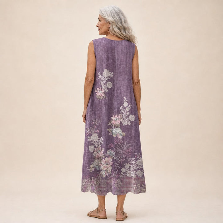 Sophie | Mouwloze midi-jurk met bloemen op paars