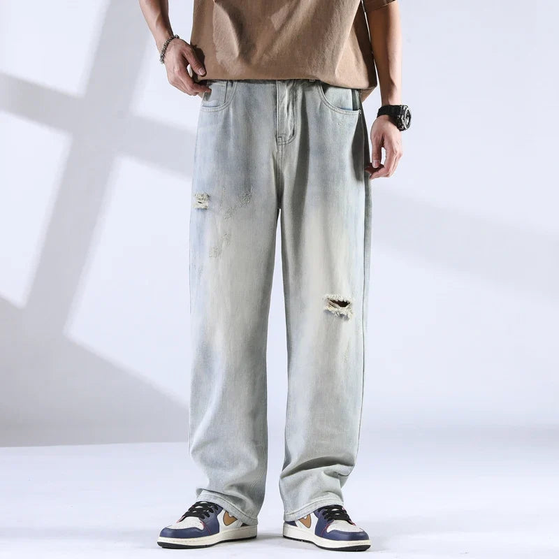 Nout | Verwassen jeans met scheurdetails en rechte pijpen