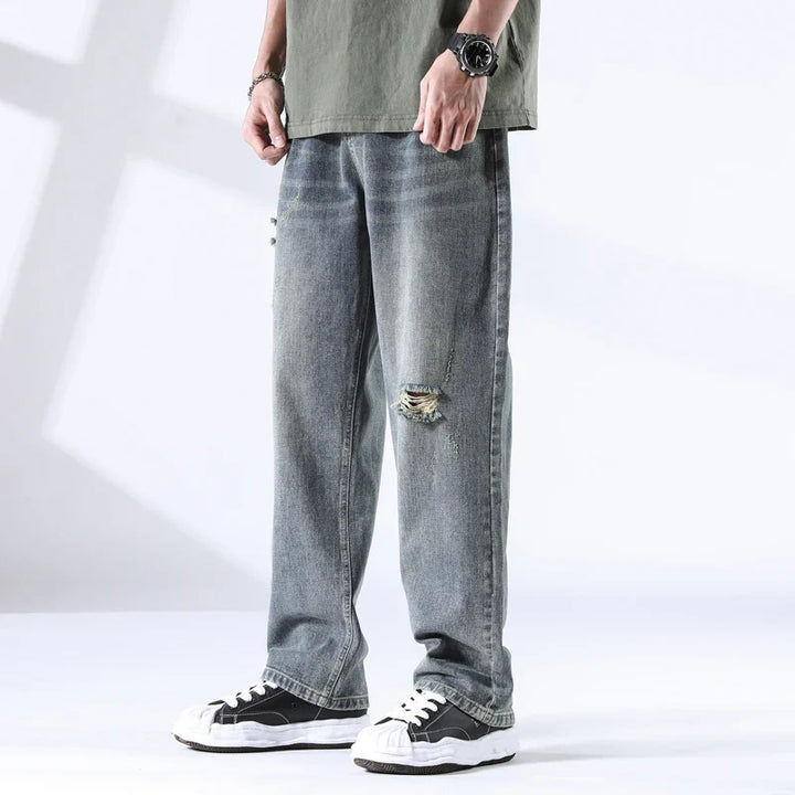 Nout | Verwassen jeans met scheurdetails en rechte pijpen