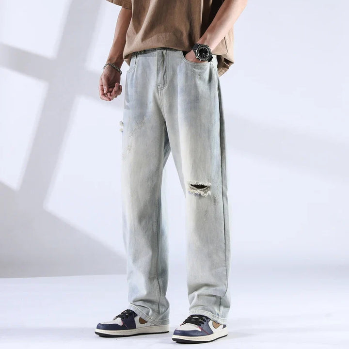 Nout | Verwassen jeans met scheurdetails en rechte pijpen