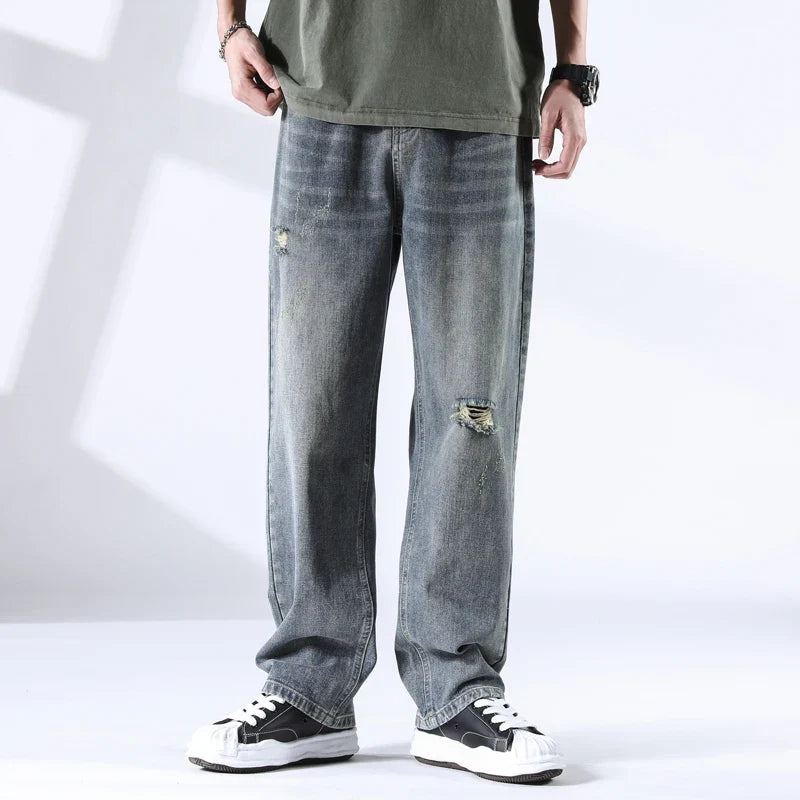 Nout | Verwassen jeans met scheurdetails en rechte pijpen