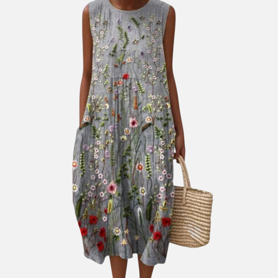 Sanne | Mouwloze midi-jurk met bloemenprint in borduurlook