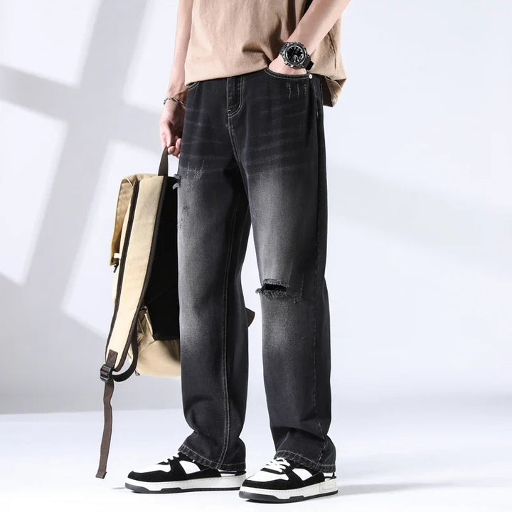Nout | Verwassen jeans met scheurdetails en rechte pijpen