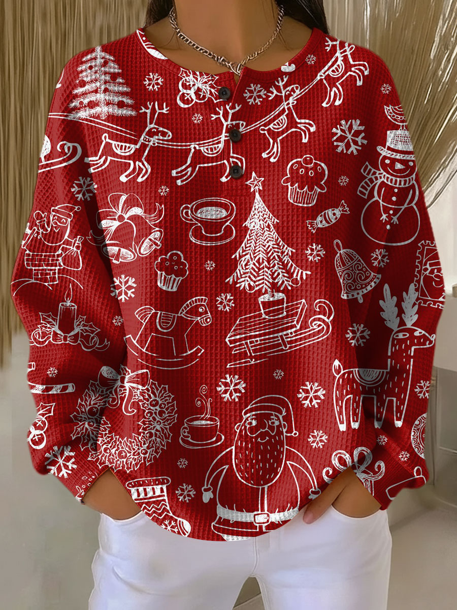 Veerle | Rode kersttrui met witte motieven