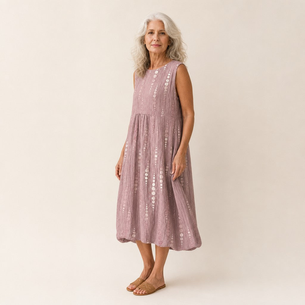 Eline | Mouwloze midi-jurk in oudroze met stippenrijen